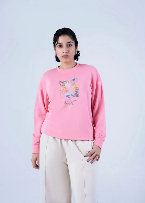 Women's pink crewneck knit sweatshirt with floral graphic logo, relaxed fit