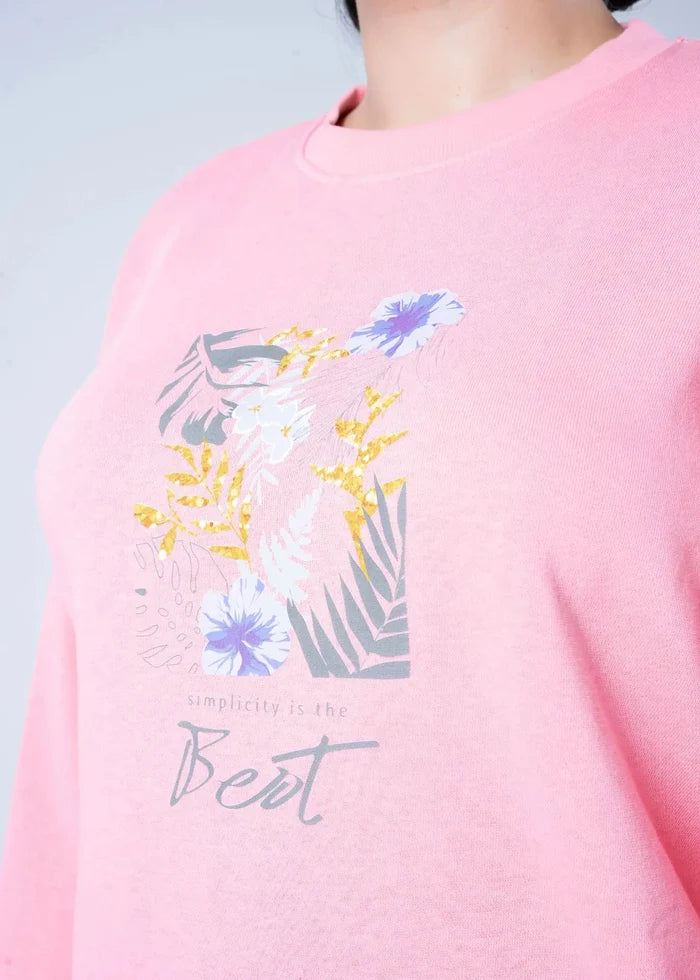 Pink crewneck knit sweatshirt with colorful floral graphic and 'Bet' script text