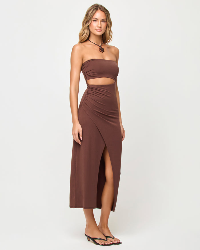 Side view of model wearing the LSPACE x The Salty Blonde Corsica Dress in espresso.