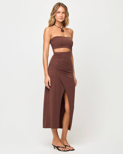 Side view of model wearing the LSPACE x The Salty Blonde Corsica Dress in espresso.
