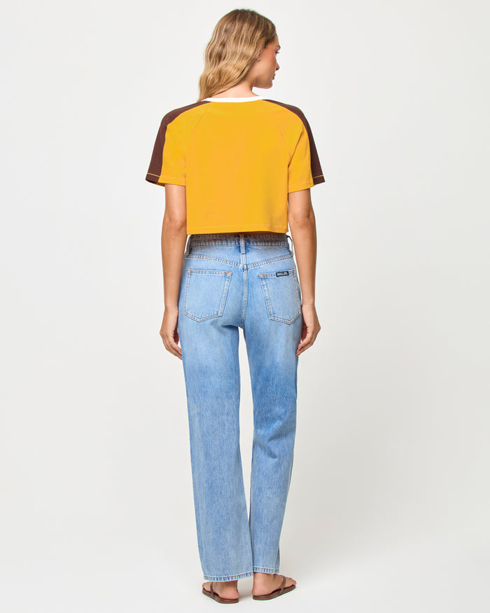 Back view of model wearing the LSPACE x The Salty Blonde Costa Crop Top in cabo sunset.