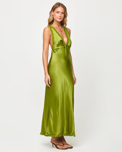 Side view of model wearing the LSPACE x The Salty Blonde Eyes On You Maxi in verdant.