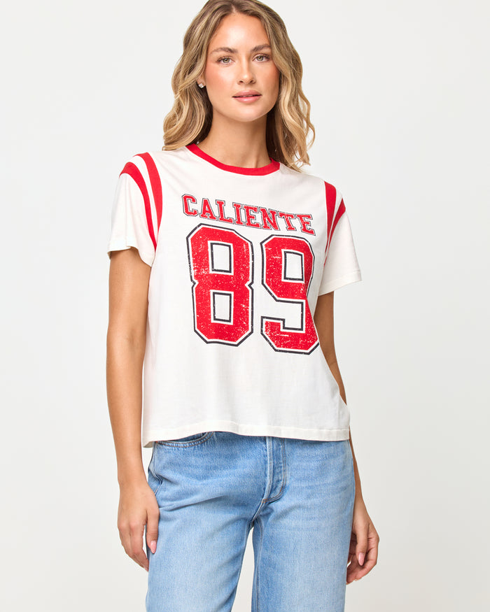 Close-up of the LSPACE x The Salty Blonde Fresca Tee in caliente showing the cropped hem and fit.