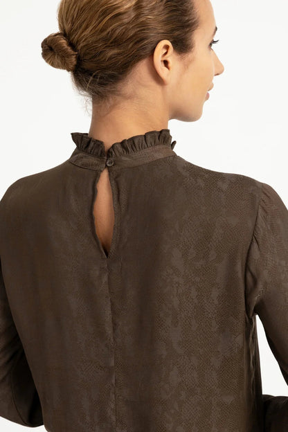 Shop YAYA’s Long Sleeve Top with Ruffle Details in Slate Black Brown Dessin at Dotique. A textured top with delicate neckline and cuff ruffles.