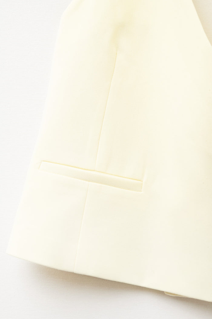 Yellow wrap vest with detailed gold button
