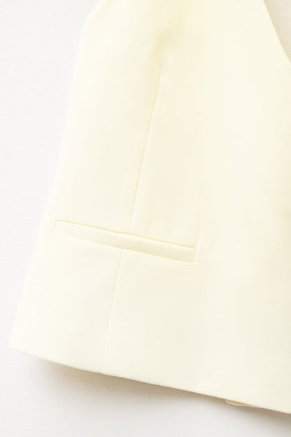 Yellow wrap vest with detailed gold button